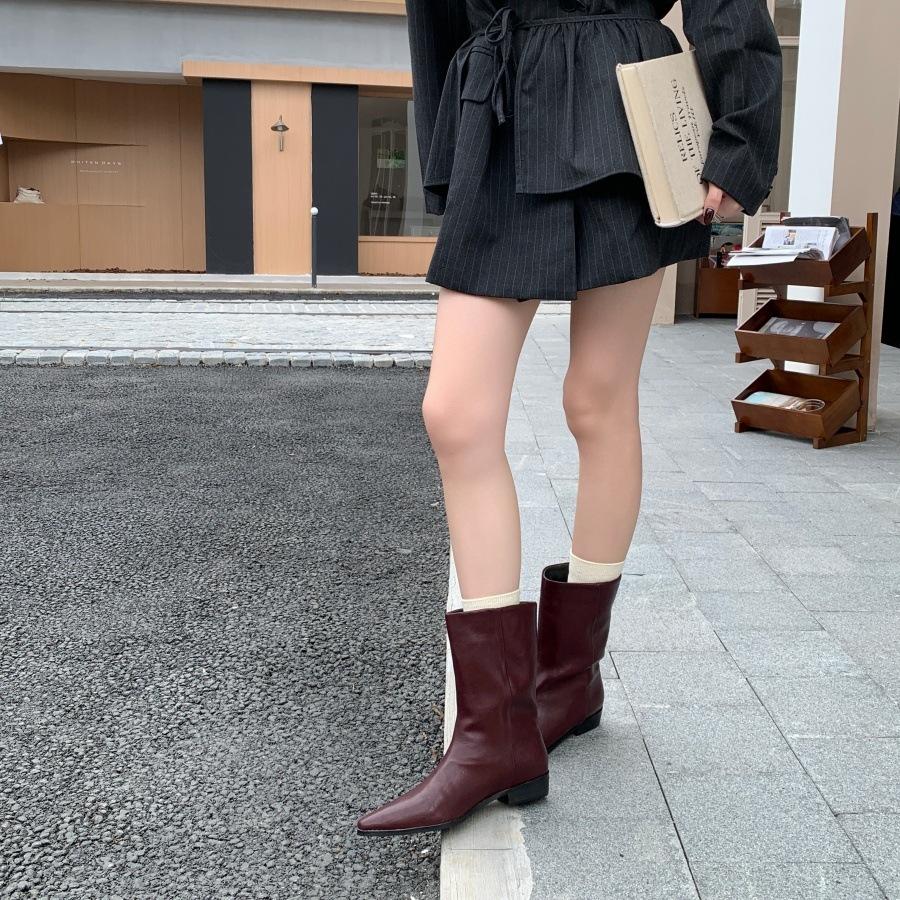 Pointed thin flat-heeled knight boots women's autumn and winter new French simple and versatile medium tube short boots