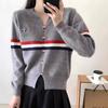 V-neck striped contrasting color puppy embroidered sweater women's autumn and winter loose design hem split long-sleeved knitted sweater