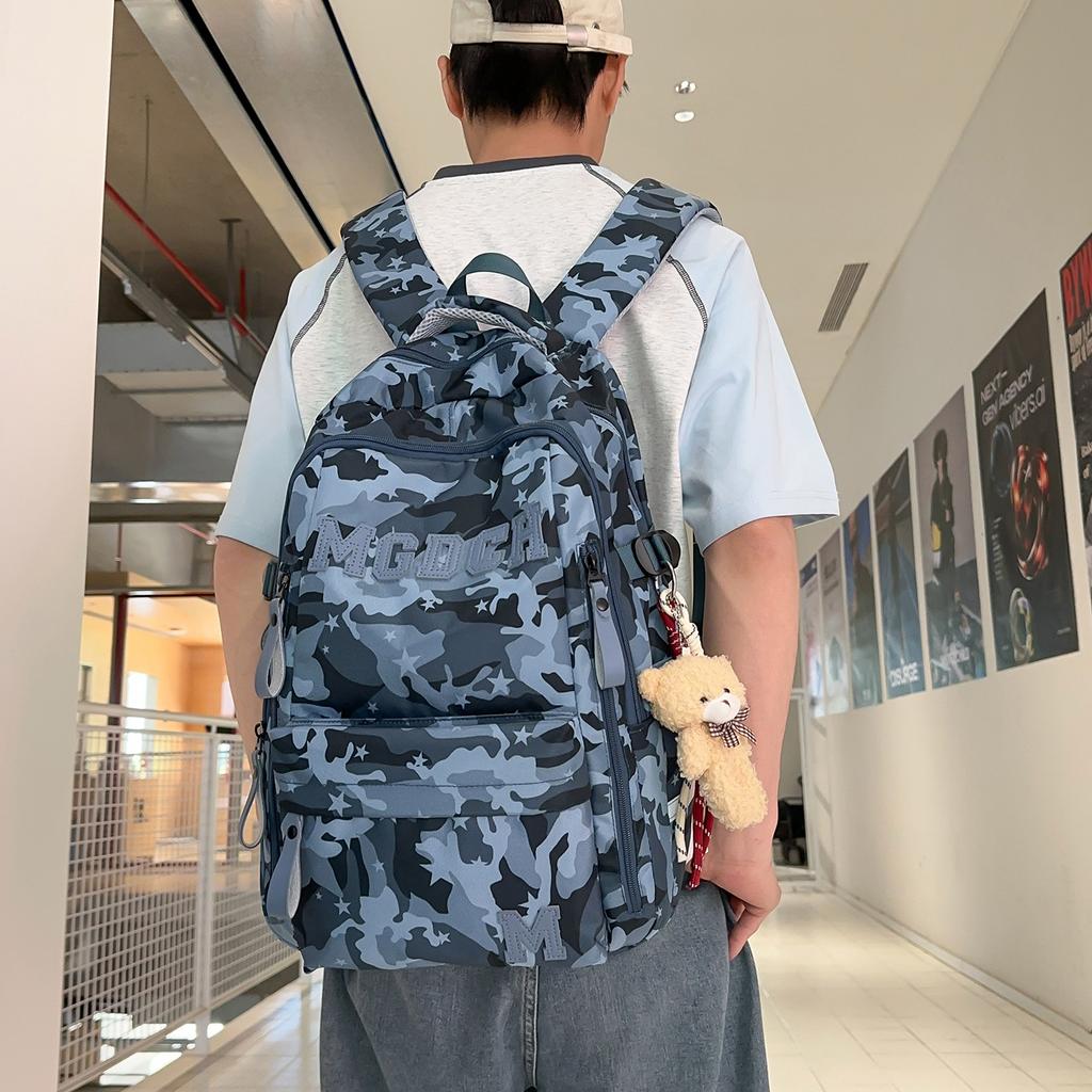 Schoolbag schoolbag female burden reduction large-capacity backpack male can hang tie rod college student travel commuter backpack tie-dye bag