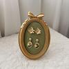 Elegant Bowknot Shape Resin Jewelry Display Holder Suitable for Necklace Earring Storage and Decorative Showcase