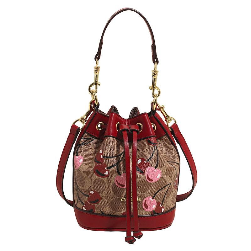 Damentaschen, Sommer 2025 Neue Koreanische Mode Nische Schultertasche, Persönlichkeitsdruck, Kirsch Umhänge-Eimertasche