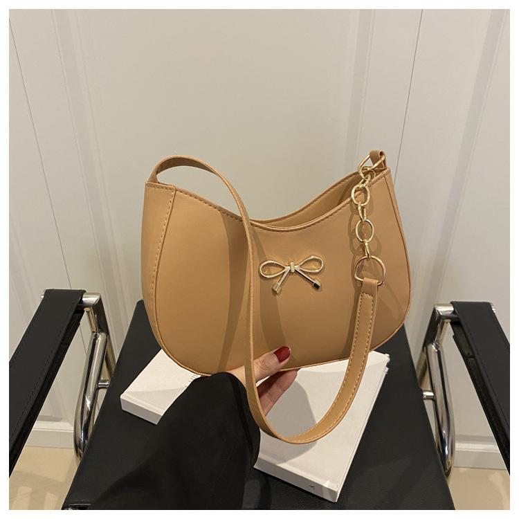 Французский бант полумесяц полумесяц сумка-ниша женская 2025 новая универсальная высококлассная текстура модная сумка на плечо сумка подмышку