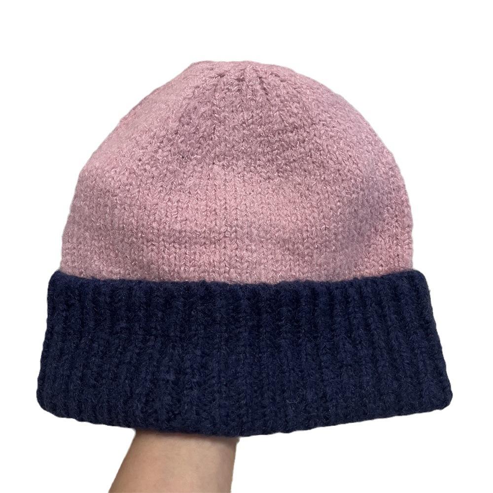 Simple two-color splicing wool hat women's autumn and winter warm niche versatile ear protection hat large version knitted pullover hat tide