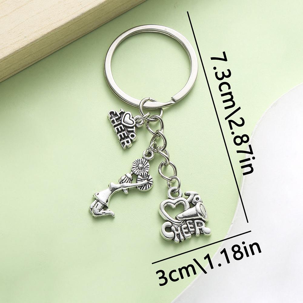 Creative Sports Keychain: PVC Rubber Football, Tennis, Basketball, Rugby Pendant - Small Gift