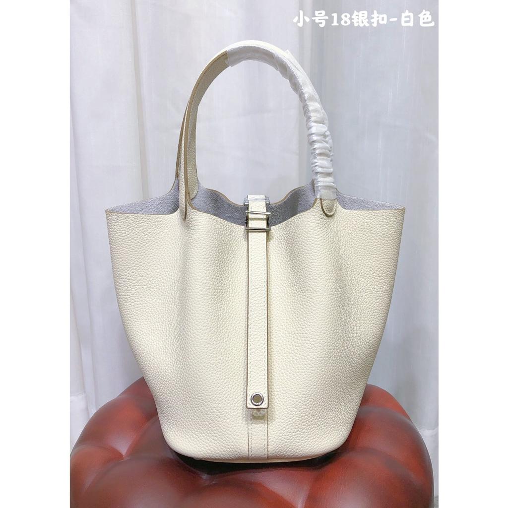 Spot wholesale top layer cowhide vegetable basket bag leather bucket bag commuter fashion lock buckle hand-held handbag woman