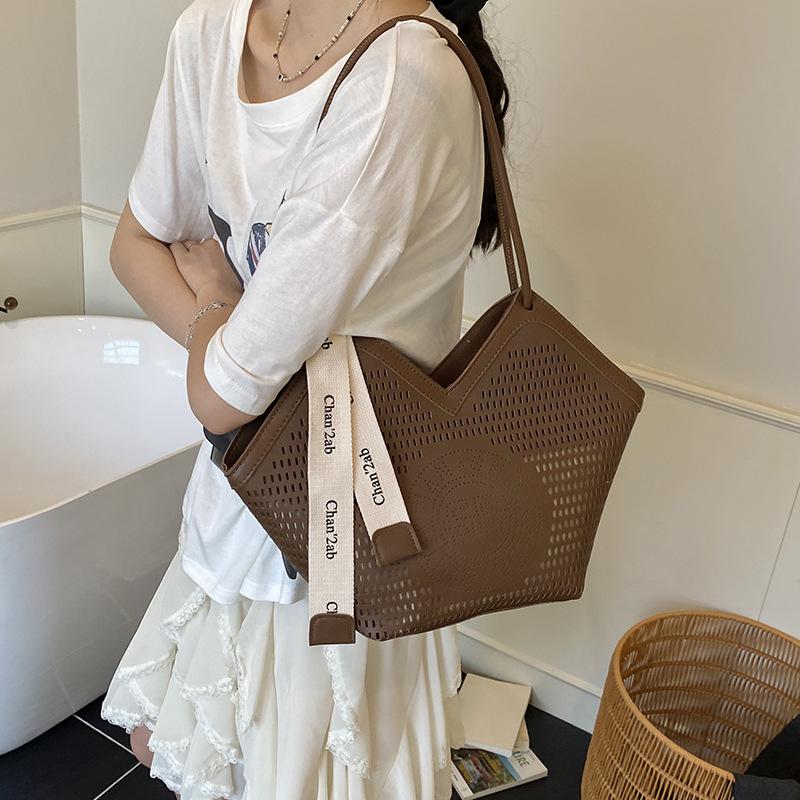Women's Bag New Tote Bag Large Capacity Armpit Bag Versatile Hollow Shoulder Bag Splicing Handbag