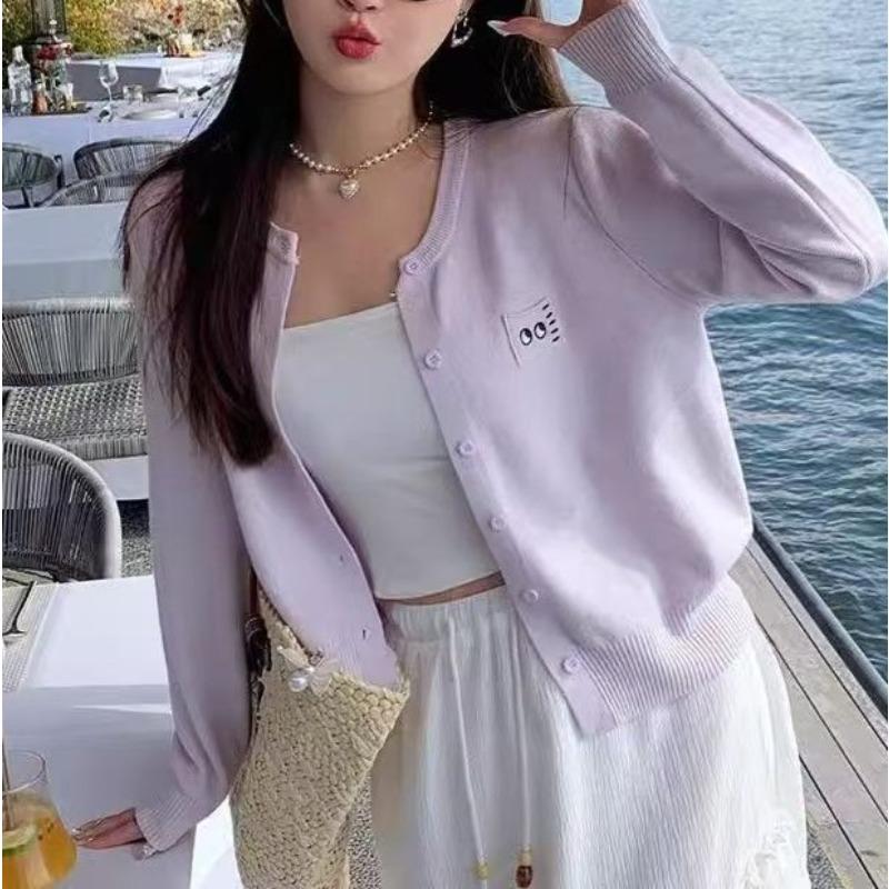 Simple knitted cardigan early autumn new women's clothing design sense long sleeve soft waxy versatile short top