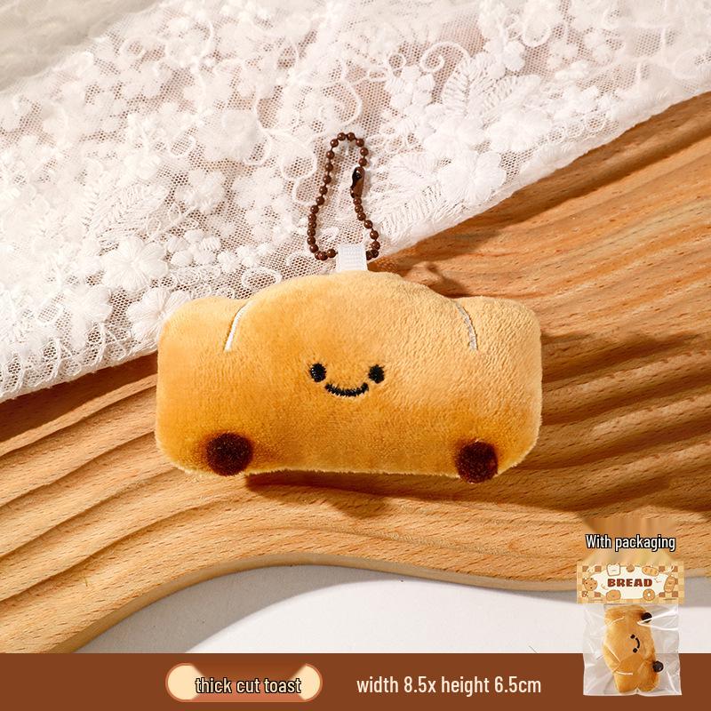 Uroczy breloczek pluszowy croissant - Mała kreskówkowa ozdoba do plecaka