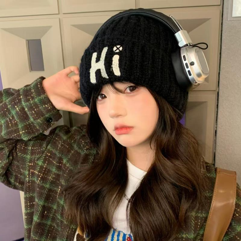 

Autumn and winter new wool hat women s warm ear protector pullover hat thickened cold hat versatile knitted hat tide 52-56cm чорний