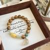 Bracelet Qiaoen Bois d'Agar & Jade Hetian pour la Stabilité Émotionnelle des Femmes