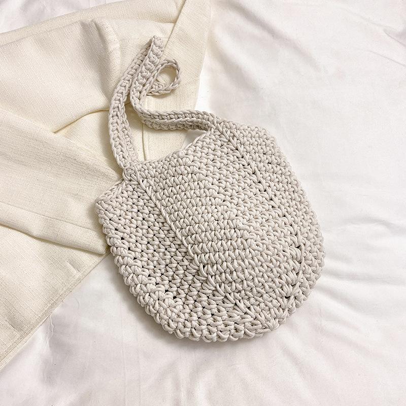 Casual large-capacity cotton thread woven bag, new openwork straw bag, lazy style shoulder bag, vacation beach bag, women's bag