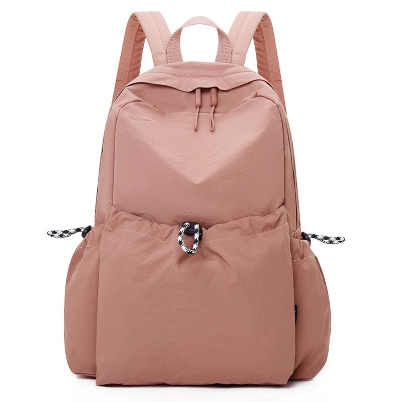 

Корейский женский нейлоновый рюкзак весна-лето 2025: Модный однотонный повседневный школьный ранец для студентов коралловый