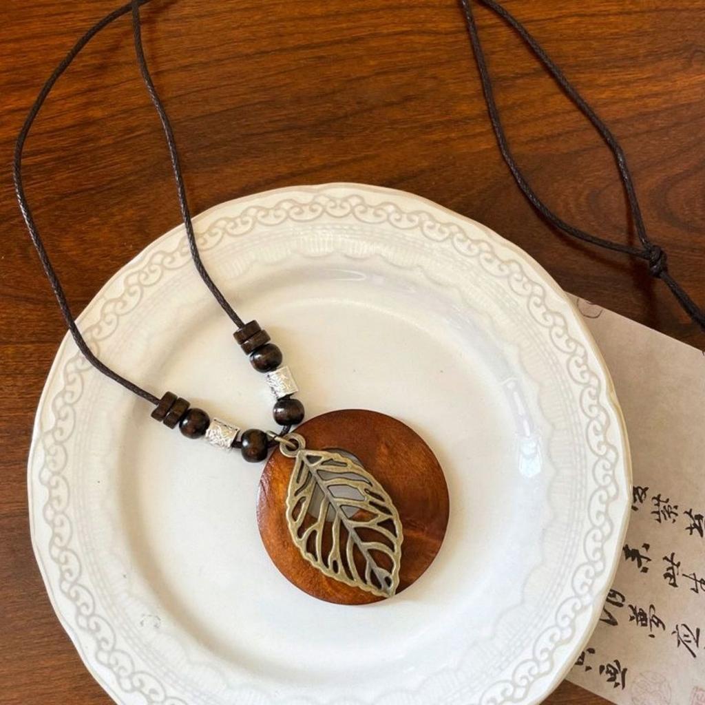 Ethnic style handmade leaf round wood necklace women's literary and retro long sweater chain cotton and linen clothing small accessories pendant