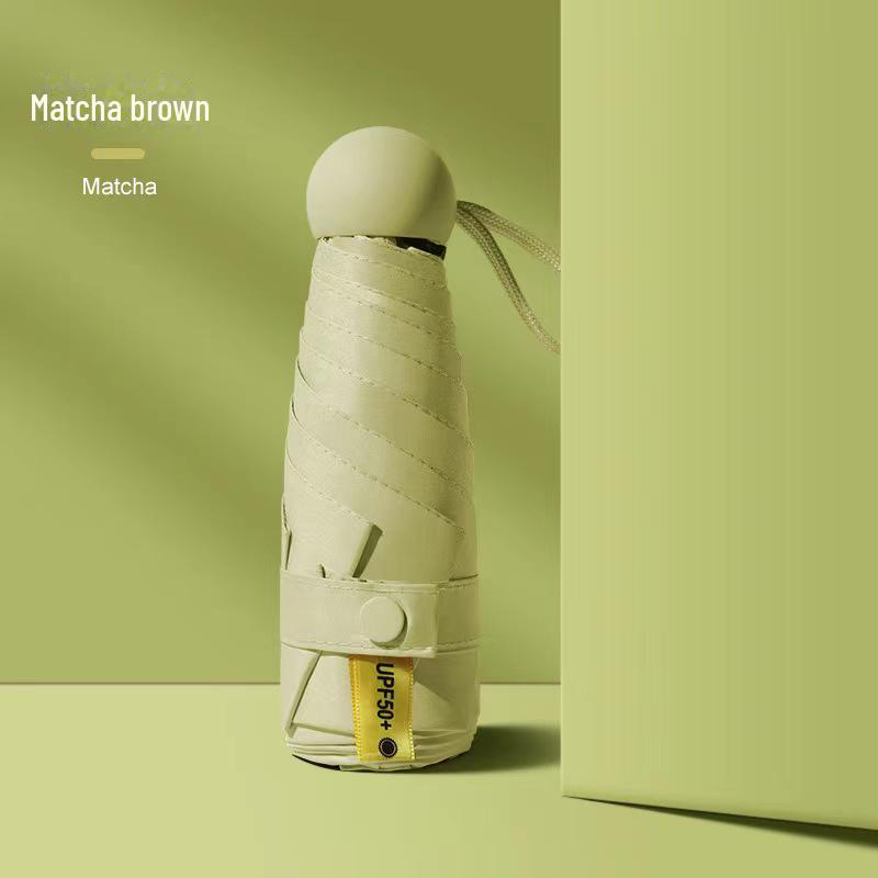 50 % rabatt på svart kapselparaply i lommeformat - Seks-skjerms sammenleggbar for sol og regn