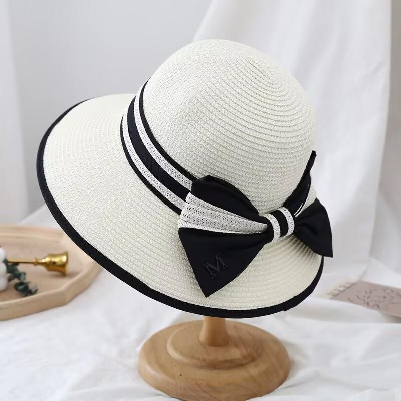 Cappello a secchiello estivo a tesa larga cappello da celebrità di Internet cappello da vacanza al mare cappello di paglia cappello parasole protezione solare cappello parasole donna moda