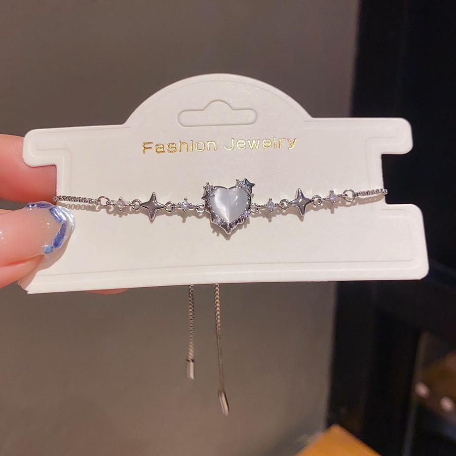 Modisches Herzförmiges Cz Stern Liebe Katzenauge Armband Mit Mikroeingefasstem Kupfer Für Damen Freizeitkleidung