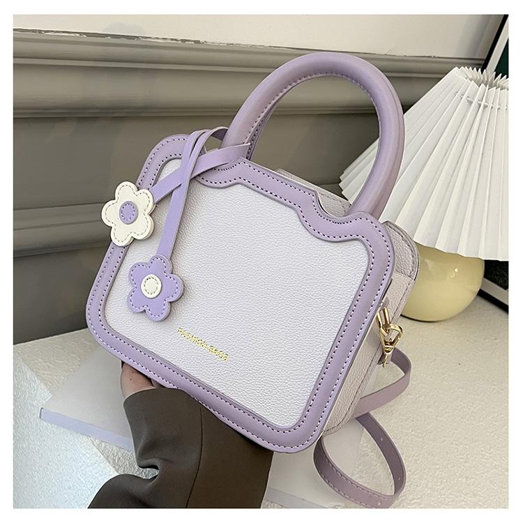 

Biscuit bag women s 2025 summer new trendy fashion high sense portable small square bag versatile shoulder bag messenger bag фиолетовый