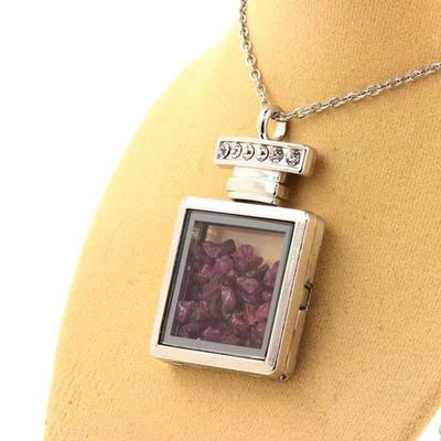 Stones and Minerals. Raw Ruby Necklace. Bottle Model.