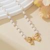 Elegant French Pearl Bow Choker Necklace for Women - Lightweight and Stylish