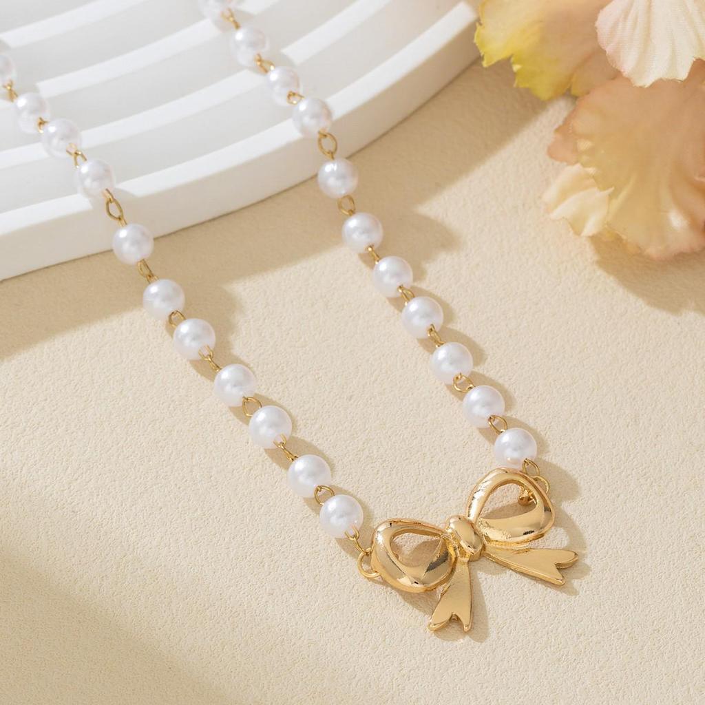 Elegant French Pearl Bow Choker Necklace for Women - Lightweight and Stylish