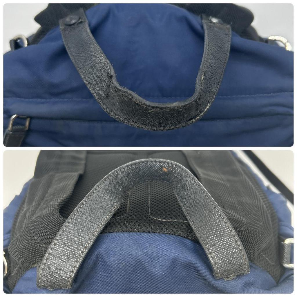 Prada 2VZ135 Stoff Rucksack Reisetasche mit Dreieckslogo Plakette Marine Schwarz Weiß Anhänger Inklusive Aufbewahrungsbeutel