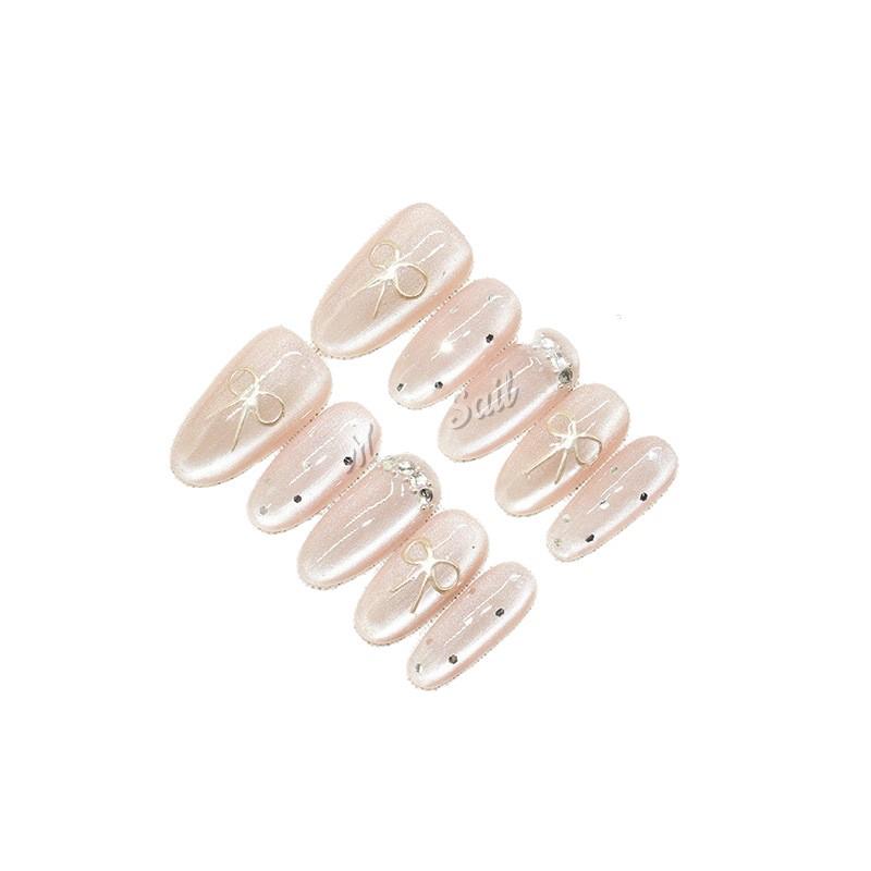 Magic Mirror Bow: Handmade Pink Cat Eye Nail Art with Sweet Heart Design