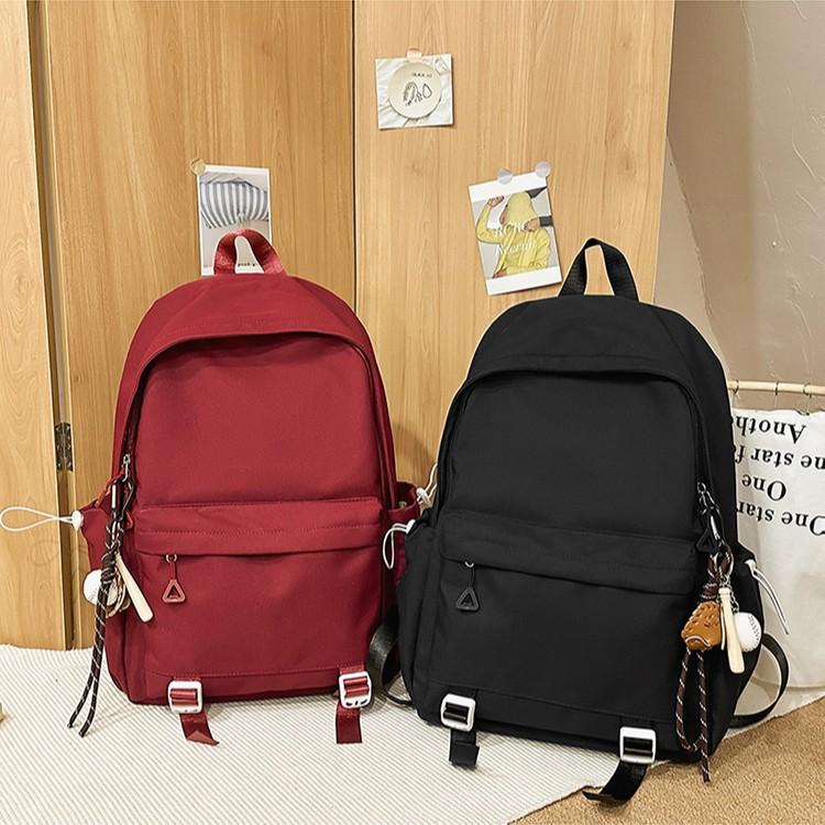 New Solid Color Schoolbag Female Simple Joker Leisure Travel Backpack Large Capacity Junior High School Students Shoulders.