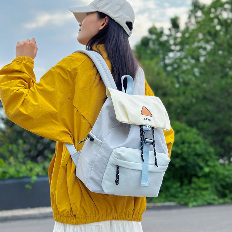 Outdoor college student schoolbag student backpack travel light leisure contrasting colors new large-capacity backpack commuting tide