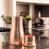 Pure Copper Bedroom Water Bottle with Inbuilt Glass, Hammered Shine Design, Drinkware and Storage Purpose, 950 Ml (Pack of 1)