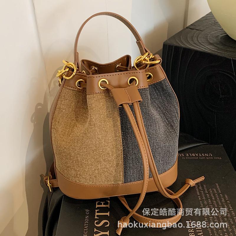 New bag women's 2025 popular bucket bag autumn and winter niche design messenger bag high-end sense work small bag