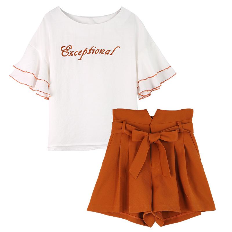 Modny damski dwuczęściowy zestaw na lato 2024: Krótki top i szorty z szerokimi nogawkami, styl hongkoński