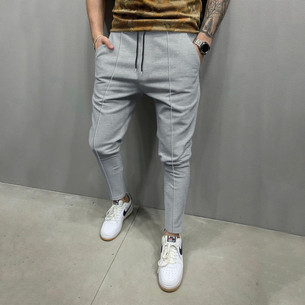 Four Seasons Men's New Solid Color Tethered Trousers Loose Casual Sports Elastic Waist Straight Pants