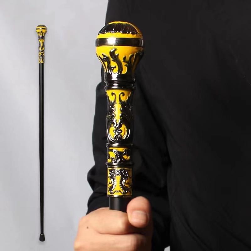 Goldene runde Kopf Metall Herren Gehstock mit kreativem Griff