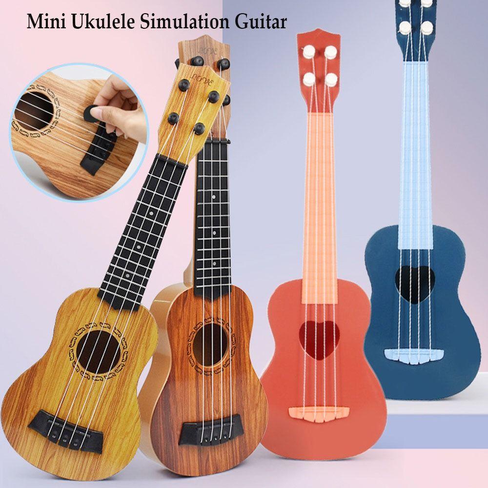 

Подарочные игрушки Рождественское образование Развивающая игрушка Моделирование гитары Мини-укулеле Музыкальные инструменты