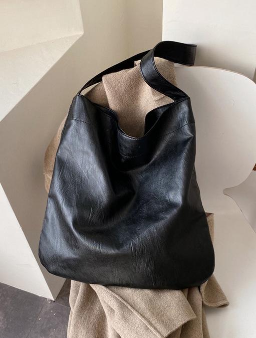 

Новые женские модные сумки через плечо, сумка-ведро, черная мягкая кожа, вместительная ручная сумка, корейские универсальные сумки через плечо для отдыха