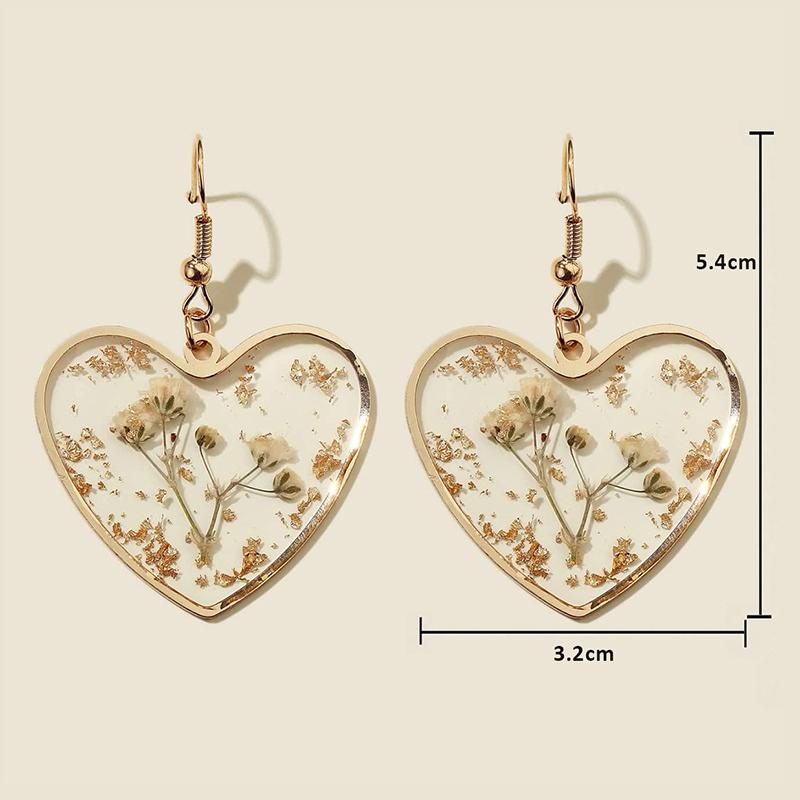 

Прозорі висушені квіти камелії. Сережки. Сережки. Сережки. Сережки. Сережки. Сережки.