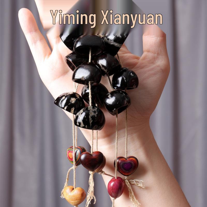 Yi Ming Xian Yuan Seed Shell Rattle Pendant: Handmade Wind Chime Bell Ornament for Backpack or Car