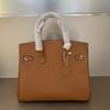 2026 New TOGO Leather Pressed Convex Mark Carriage Platinum Bag Genuine Leather Women's Bag First Layer Cowhide European and American Hand Bag