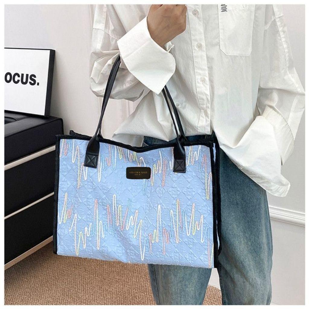 

Fashion Trend Embossed Handbag 2025 College Student Versatile Large Capacity Commuting Appearance Handheld Canvas Shoulder Bag синий