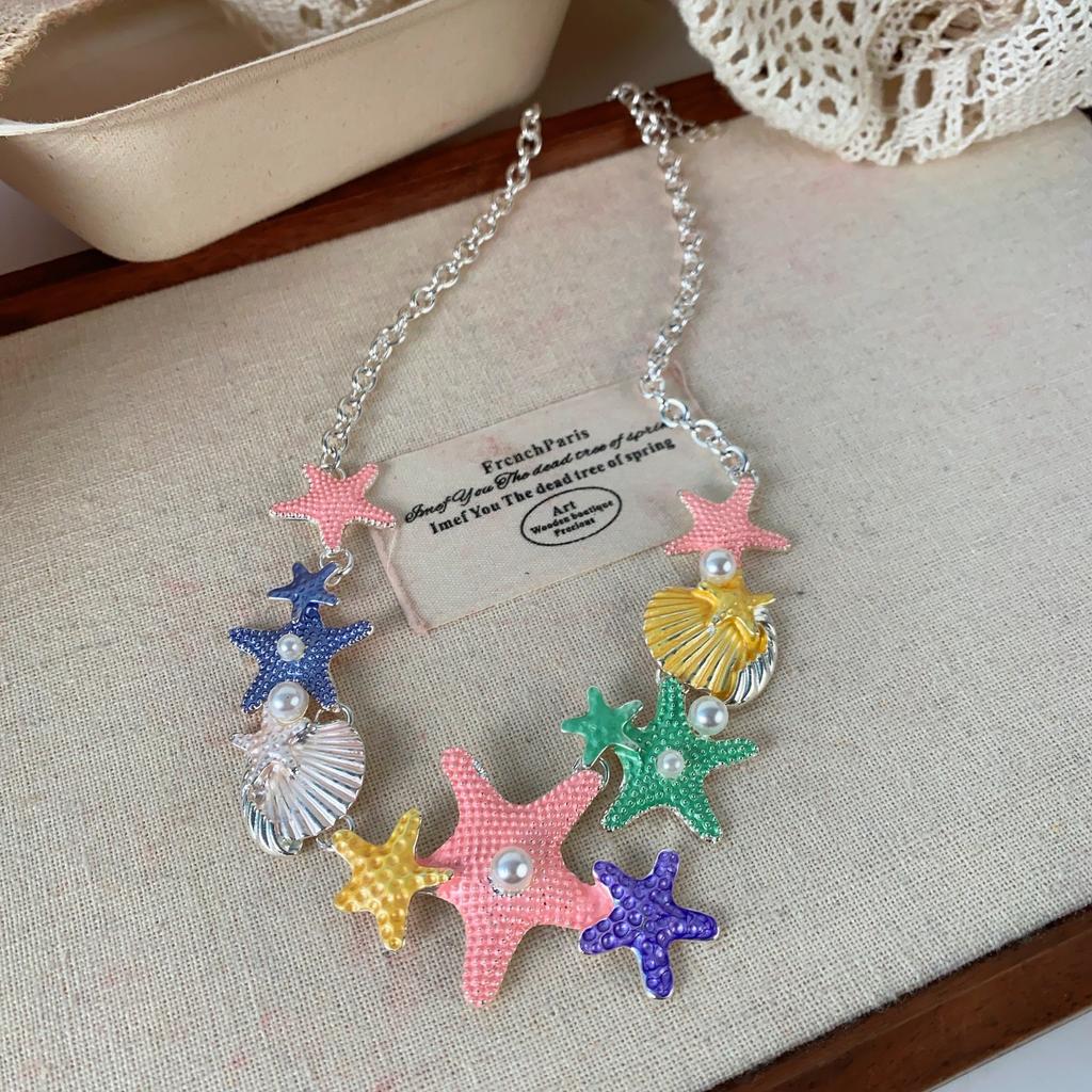 European and American ins star shell long necklace women's versatile high-end inlaid pearl dripping oil collarbone chain necklace