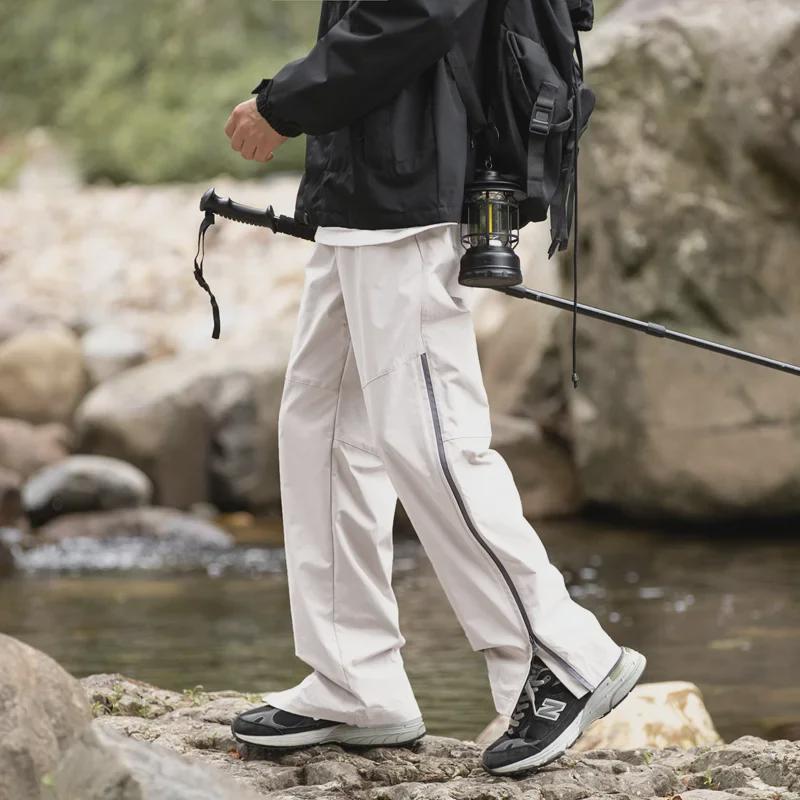 Unisexové rychleschnoucí větruodolné turistické kalhoty na jaro/podzim