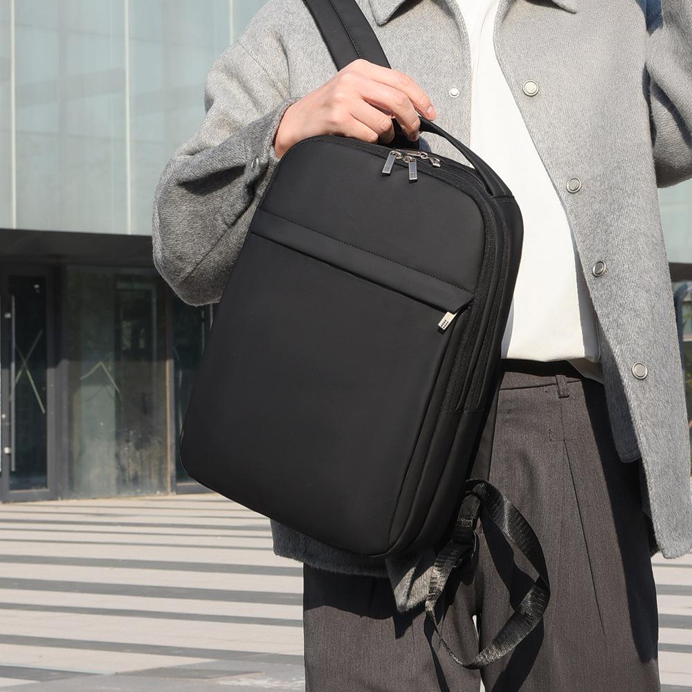 Sleek Minimalist Backpack with Front Zipper Pocket and Padded Shoulder Straps