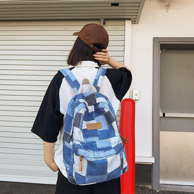 Large-capacity new middle school schoolbag, junior high school backpack, boys' casual versatile college student computer bag, women