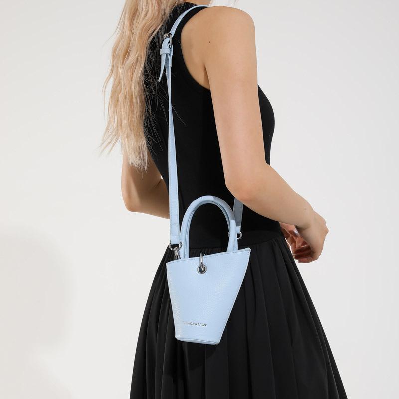 Niche design fashionable versatile hand bag women's summer new simple retro messenger bucket bag