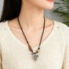 Stylish Alloy Accent Necklace With Sliding Closure Braided Cord and Natural Wood Materials