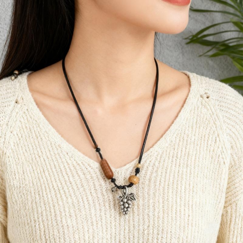 Stylish Alloy Accent Necklace With Sliding Closure Braided Cord and Natural Wood Materials