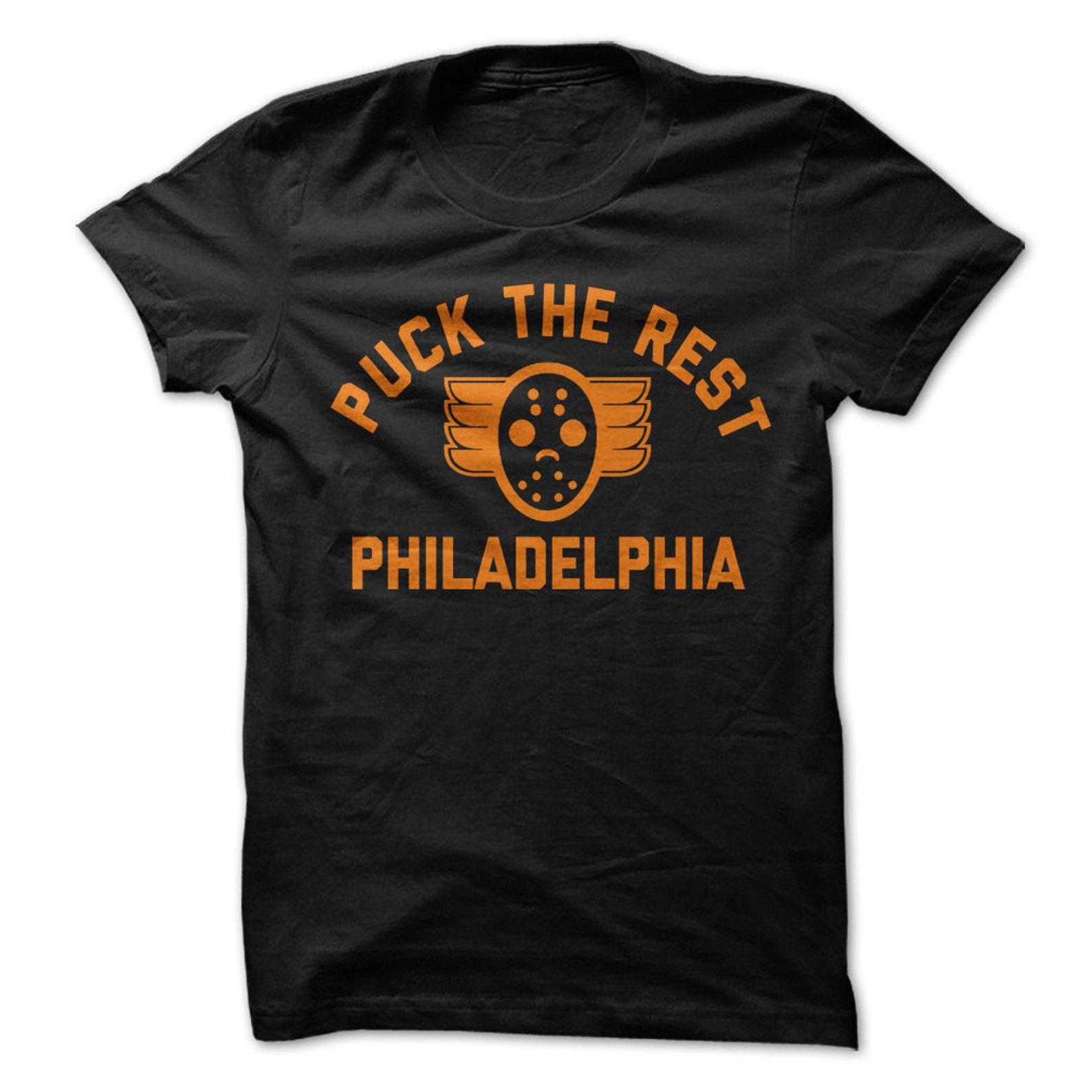 Puck the Rest - Philadelphia T-Shirt Design - Black T-shirt with Orange Print S
