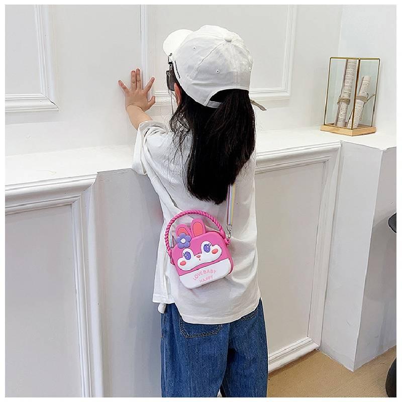 Entzückender Regenbogen-Cartoon-Silikon-Kinderrucksack mit 3D-Kaninchenlächeln und stilvollem Design