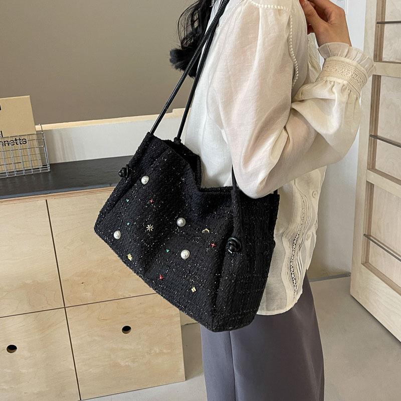 Large-capacity bag women's 2025 spring and summer new fashion woven tote bag simple and versatile commuter shoulder bag
