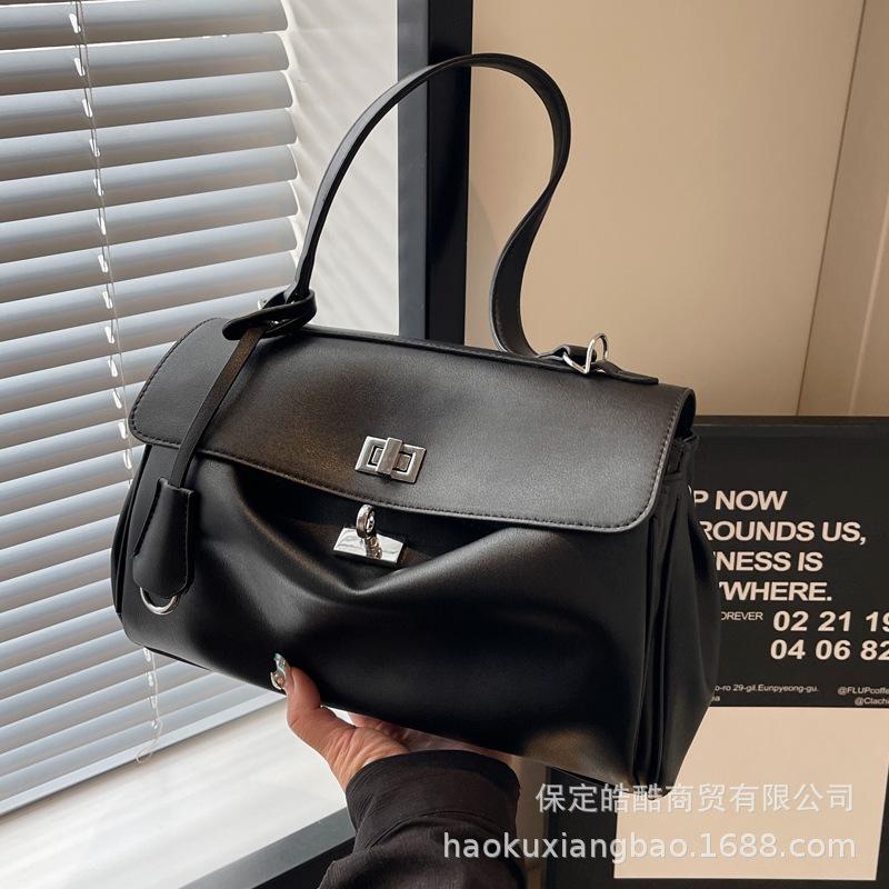 Geantă portabilă platinată pentru femei 2025 nouă la modă nișă coreeană geantă sub braț senzație high-end de stil străin geantă navetă de mare capacitate